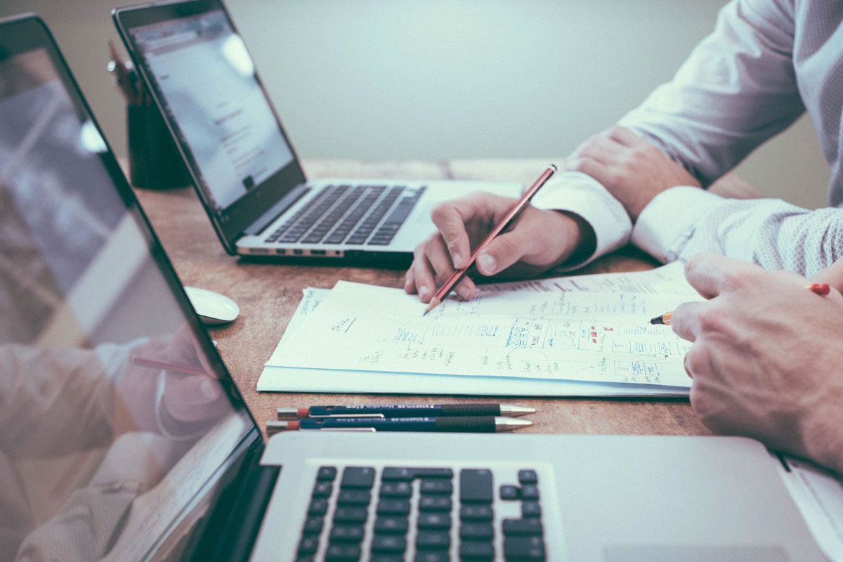 Two Men Working On Wireframes Two Men Working On Wireframes